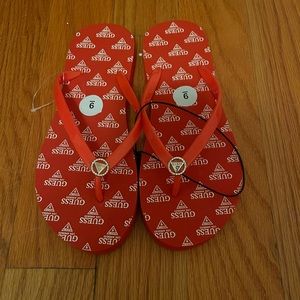 NWT red Guess flip flops